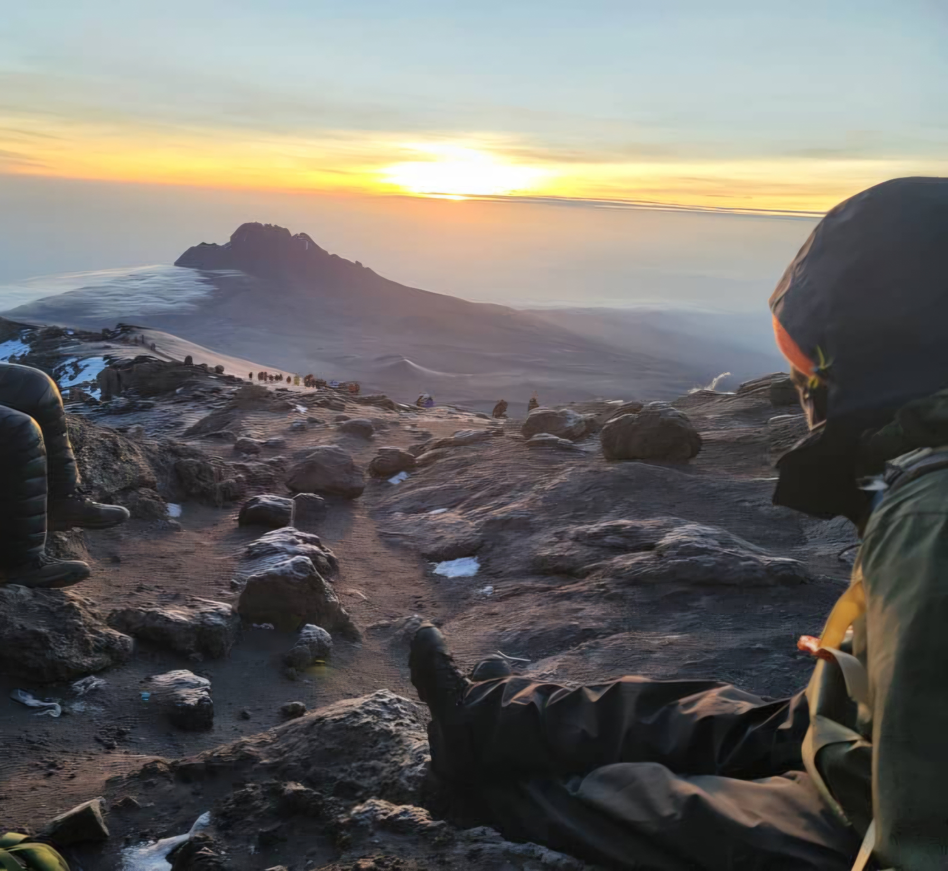 Misty sunrise over the snow-capped summit of Mount Kilimanjaro